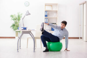 A swiss ball can help improve employee fitness while at work